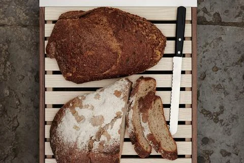 Fresh sliced bread on the table Stock Photos