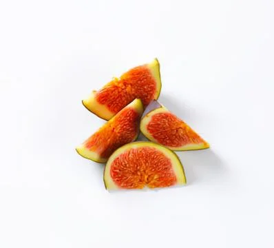 Fresh sliced figs on clean surface Stock Photos