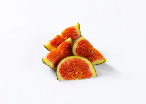 Fresh sliced figs on clean surface Stock Photos