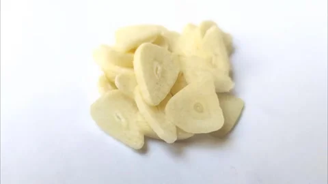 Fresh Sliced Garlic on White Background Stock-Footage 280092928