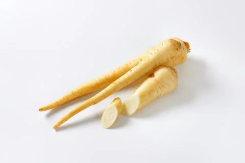 Fresh sliced ginger root with whole pieces Stock Photos