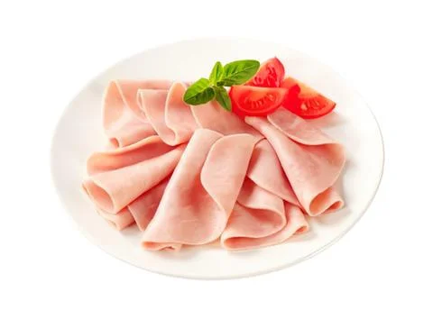 Fresh sliced ham with cherry tomato garnish Stock Photos
