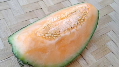 Fresh Sliced Hami Melon Fruit On Table Stock Footage 340126096