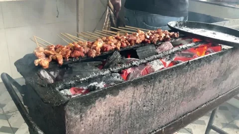 Fresh sliced lamb on the grill and smoke Stock Footage 228907305