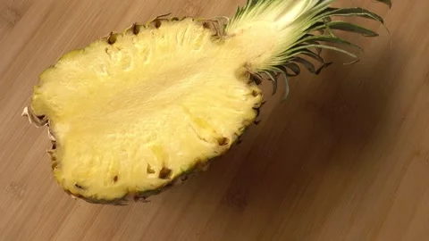 Fresh Sliced Pineapple in Rotation Stock Footage 331583713