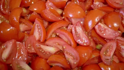 Fresh Sliced Red Tomatoes Rotating With Juicy Texture And Seeds 库存影片 330117873