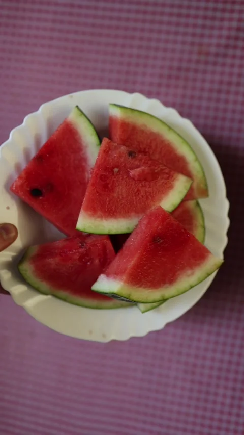 Fresh sliced watermelon on a plate Stock Footage 340221360