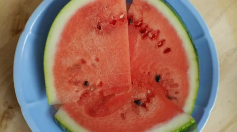 Fresh sliced watermelon - watermelon on a rotating plate Stock Footage 52450737
