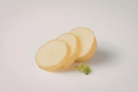 Fresh sliced yellow ginger root with parsley Stock Photos