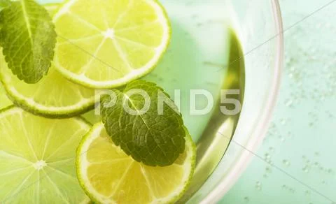 Fresh slices lemon with leaf mint Stock Photos