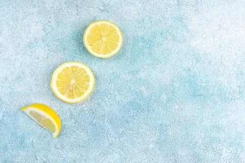 Fresh slices of lemons on bright background. Lemon fruit citrus. Summer the.. Stock Photos