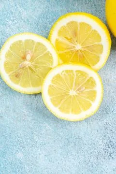 Fresh slices of lemons on bright background. Lemon fruit citrus. Summer the.. Stock Photos