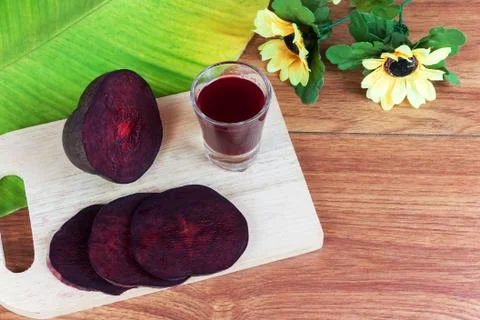 Fresh slices red beet root and juice Stock Photos