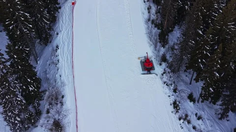 Fresh snow groomer preparing ski slope in the Carpathians in Bulgaria Stock Footage 337990890