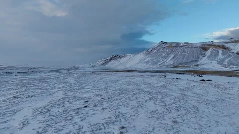 Fresh snowfall at Hverir mud pools near Myvatn in Iceland Stock Footage 320589170