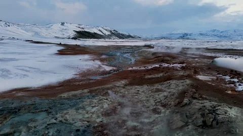 Fresh snowfall at Hverir mud pools near Myvatn in Iceland Stock Footage 320589196