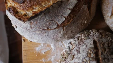 Fresh sourdough bread on kitchen Stock Footage 195999967