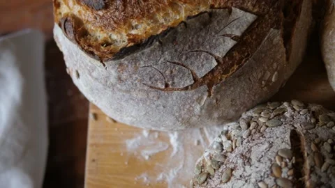 Fresh sourdough bread on kitchen table Stock Footage 196000010