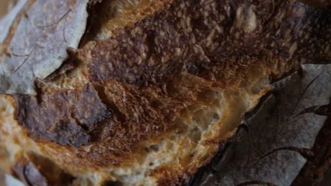 Fresh sourdough bread on kitchen table Stock Footage 196000042