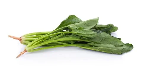Fresh spinach on white background Photos