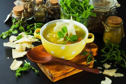 Fresh split pea soup with crackers and herbs Fresh split pea soup with pit... Stock Photos