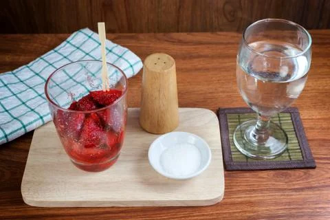 Fresh split strawberries mixed Stock Photos