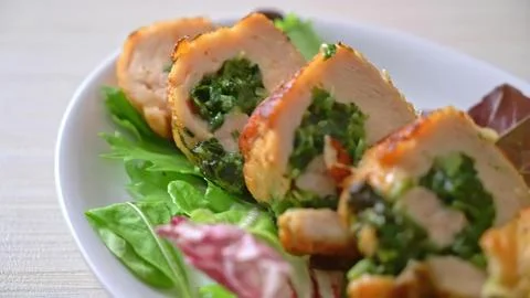 Fresh spring roll with vegetables and herbs on white plate Stock Photos