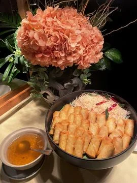 Fresh spring rolls in tray on buffet. Stock Photos