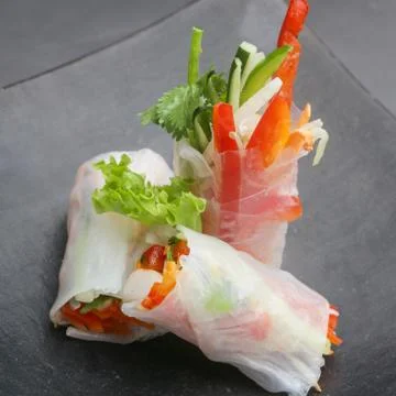 Fresh spring rolls wrapped in the rice paper Stock Photos
