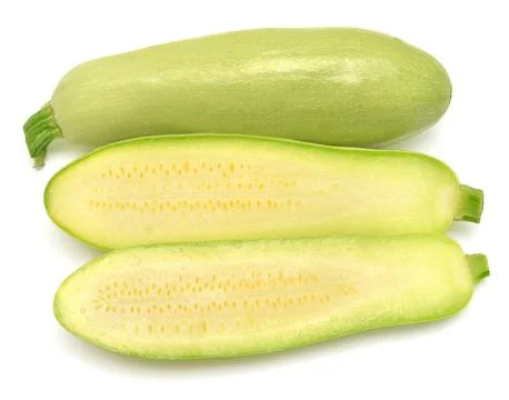 Fresh squash vegetable marrow zucchini whole and half isolated on white bac.. Stock-Fotos