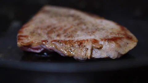 A fresh steak is fried in the pan Stock-Footage 141646382