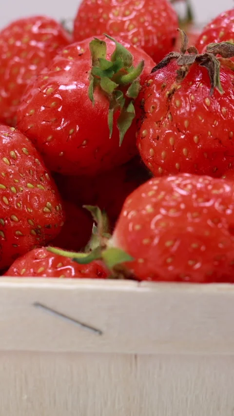 Fresh strawberries in basket on white background, smooth motion Stock-Footage 333099819