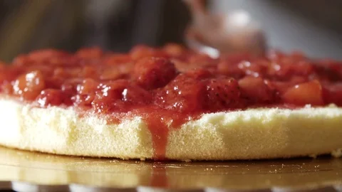 Fresh strawberries jam on sponge-cake Stock Footage 73746995