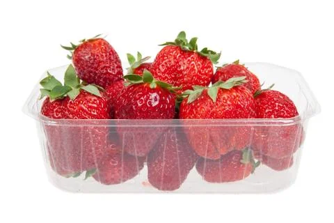 Fresh strawberries in plastic box, isolated on white Stock-Fotos