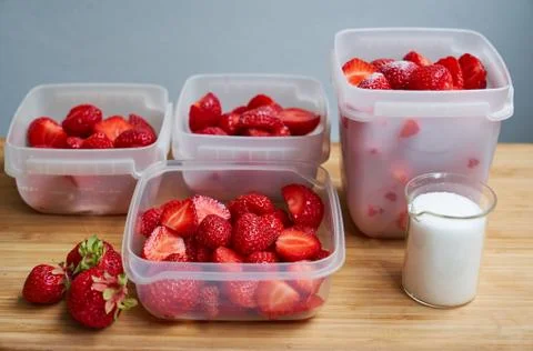 Fresh strawberries in plastic boxes Stock Photos