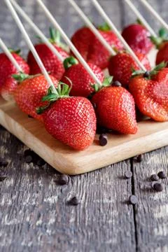 Fresh strawberries Red strawberries Beautiful strawberries on skewers Straw.. Stock Photos