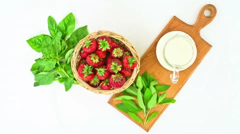 Fresh Strawberries on a white background. Top view. stop motion animation, 4K Stock Footage 68084385