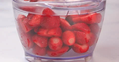 Fresh strawberry in the blender Stock Footage 133874259