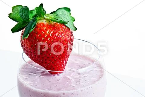Fresh strawberry smoothie macro Stock Photos