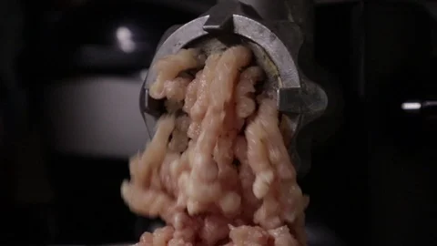 Fresh stuffing made on the grinder. Kitchen appliance. Vídeo Stock 129036435