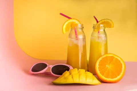 Fresh summer cold mango cocktail with orange. High quality photo Stock Photos