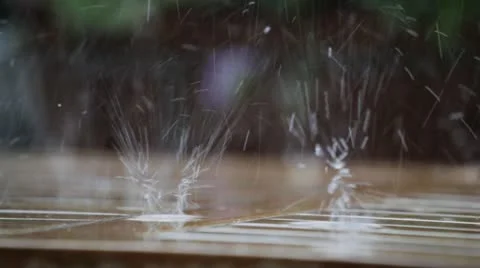 Fresh summer rain on a table, splashing, thunderstorm, 1080p Stock Footage