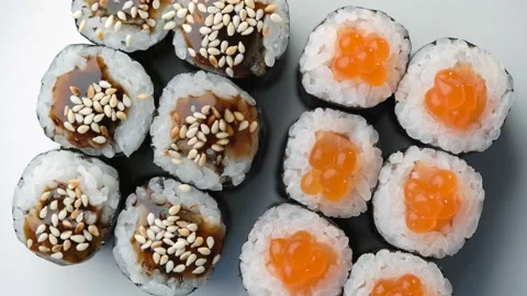 Fresh Sushi roll set rotating. Typical Japanese food, dish consisting of rice Stock Footage 125360687