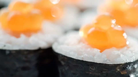 Fresh Sushi roll set rotating. Typical Japanese food, dish consisting of rice Stock Footage 125361023