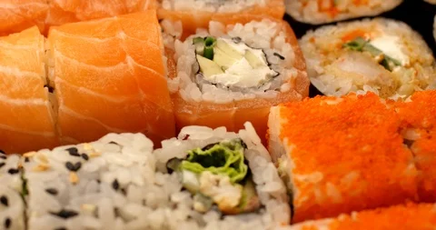 Fresh Sushi rolls rotating in slow motion. Extreme close up view, shot on RED 6K Stock Footage 107395853