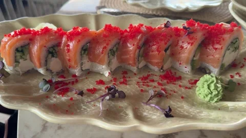 Fresh sushi rolls on serving plate Stock Footage 339733092