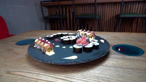 Fresh sushi on  table in motion Video stock 91839909