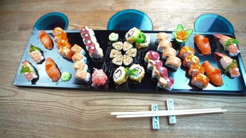 Fresh sushi on  table in motion Video stock 91840015