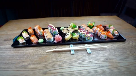 Fresh sushi on  table in motion Video stock 91840145