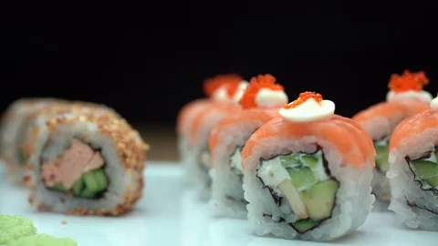 Fresh sushi on  table in motion Stock Footage 91840234